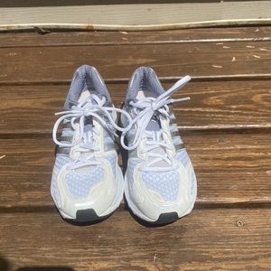 white and silver adidas sneaker